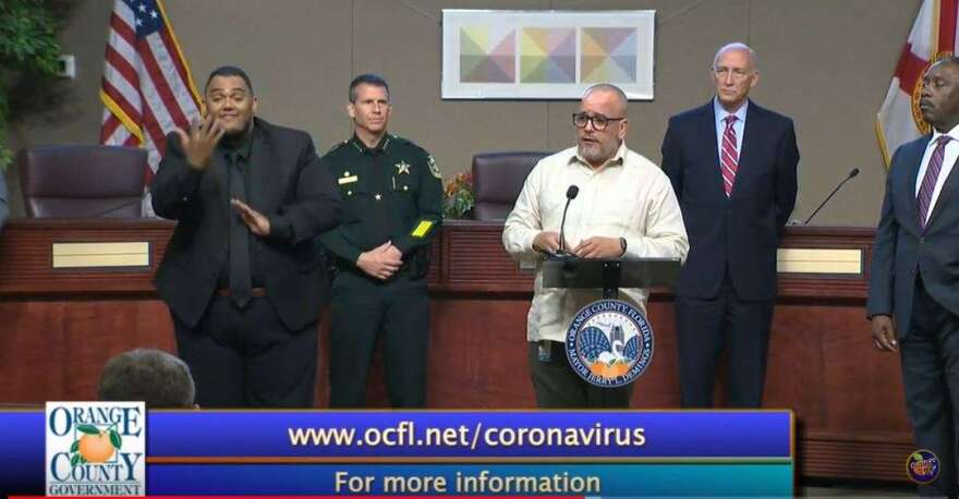 Dr. Raul Pino addresses the media on Thursday March 26th. Image: Orange TV