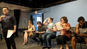 Actors with Playwrights' Round Table perform a staged reading of a new play.