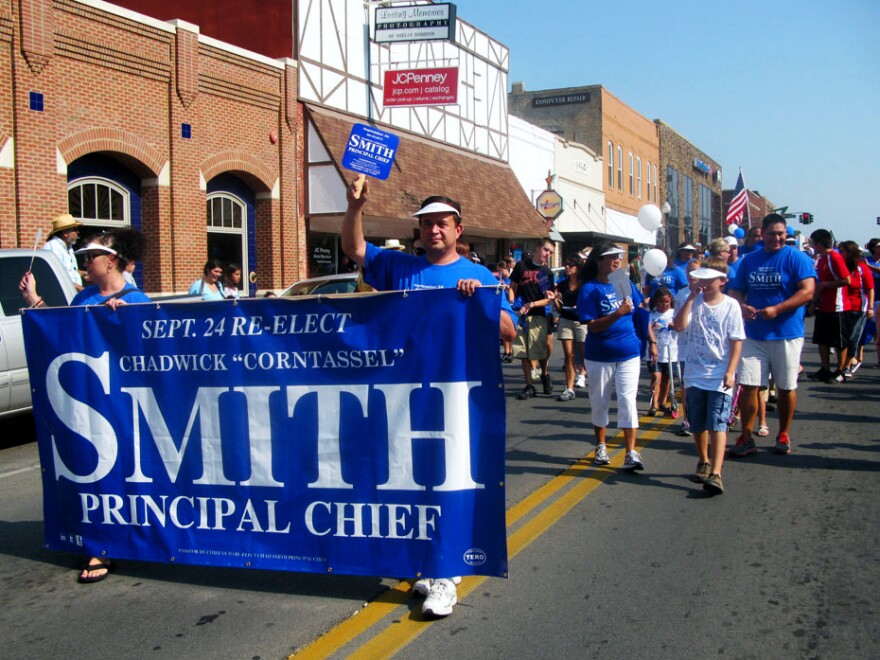 Supporters of Chad Smith take part in the Cherokee National Holiday parade on Sept. 3 in Tahlequah, Okla., the heart of Cherokee country, on Labor Day weekend. Smith was tribal chief from 1999 until earlier this year. He is hoping to win re-election later this month. The federal government says it won't recognize the election results.