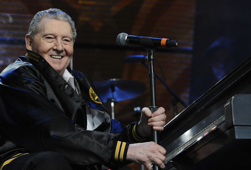 FILE - Jerry Lee Lewis performs during Farm Aid on Sept. 20, 2008 in Mansfield, Mass. On Saturday, Nov. 5, 2022, family, friends and fans will gather to bid farewell to rock ‘n’ roll pioneer Jerry Lee Lewis at memorial services held in his north Louisiana home town. (AP Photo/Lisa Poole, File)