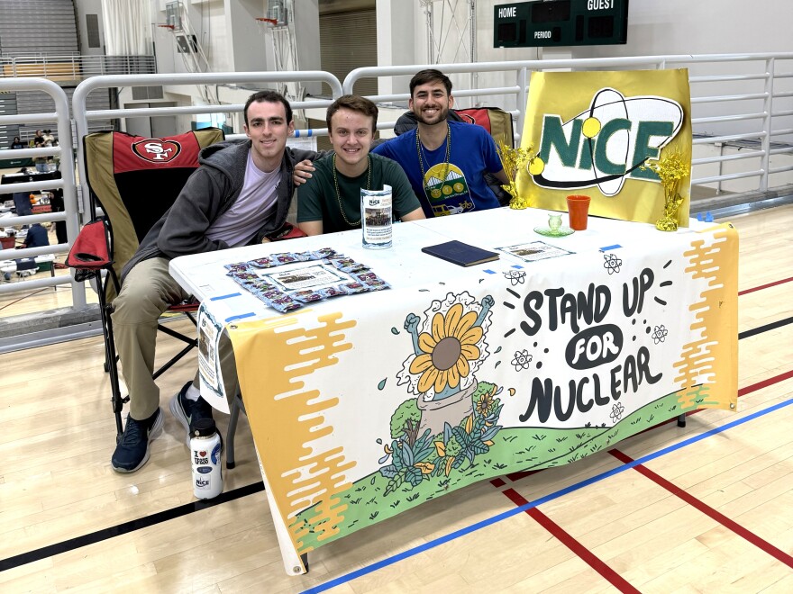 Zach Mousharrafie, Liam Brown (middle) and Hari Rajah tabling at a Cal Poly event.