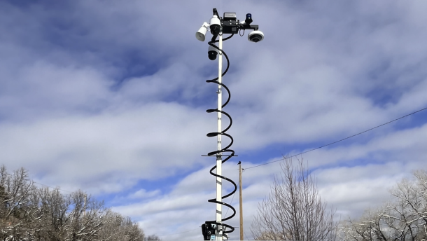 A Flock camera sits by the side of a road in Durango, Colorado.