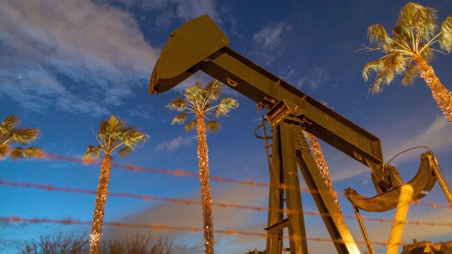 A U.S. crude oil benchmark has hit record lows. Above, pump jacks draw crude oil near Long Beach, Calif., on March 9.