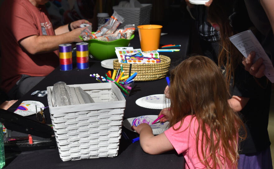 Kids create paper shakers