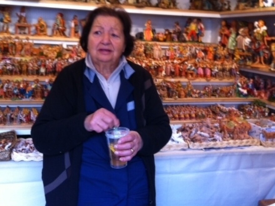 Anna Alferoni, 80, runs the oldest stall in Piazza Navona, site of Rome's most popular Christmas market. This year, she's having trouble selling even relatively inexpensive Nativity scene figurines.