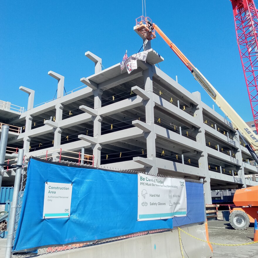 A 'topping off' ceremony was held in Springfield, Mass., February 20, 2024, marking the placement of a final slab of concrete on the building of a new garage. 