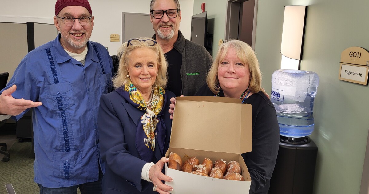 U.S. Rep. Debbie Dingell delivers Paczkis and political message in visit to WEMU