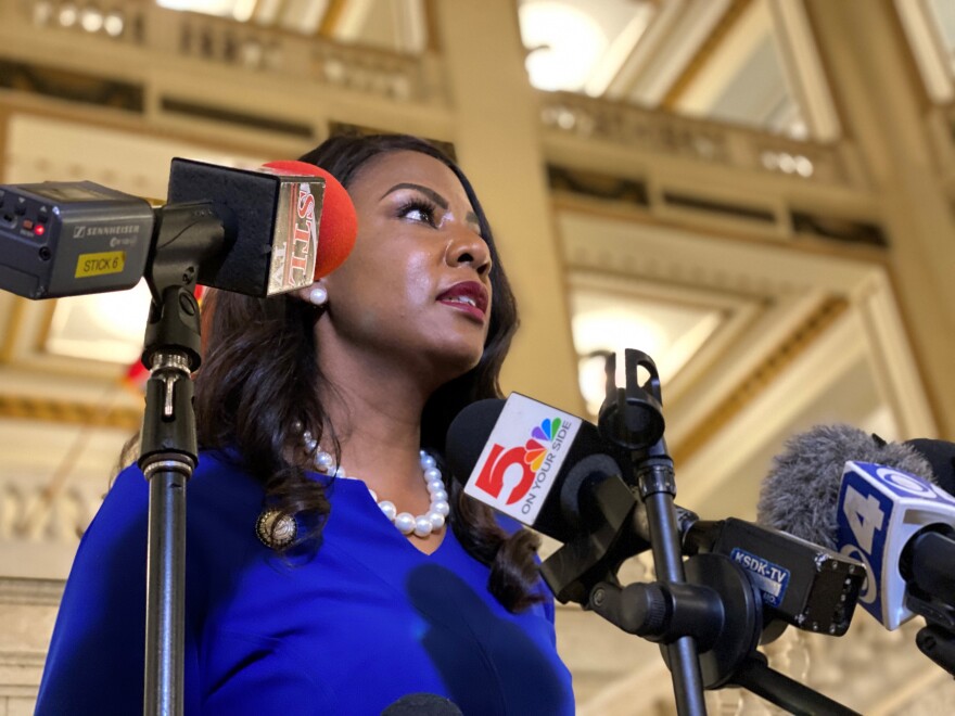 Jones speaks to reporters on April 7, 2021, after meeting with outgoing St. Louis Mayor Lyda Krewson