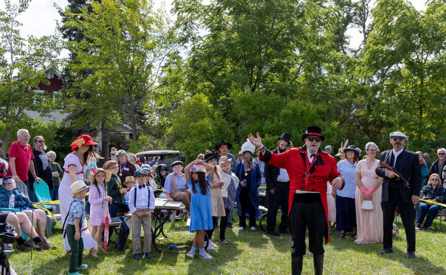 Harrisville community members dressed up to celebrate the opening of the 100-year-old safe.