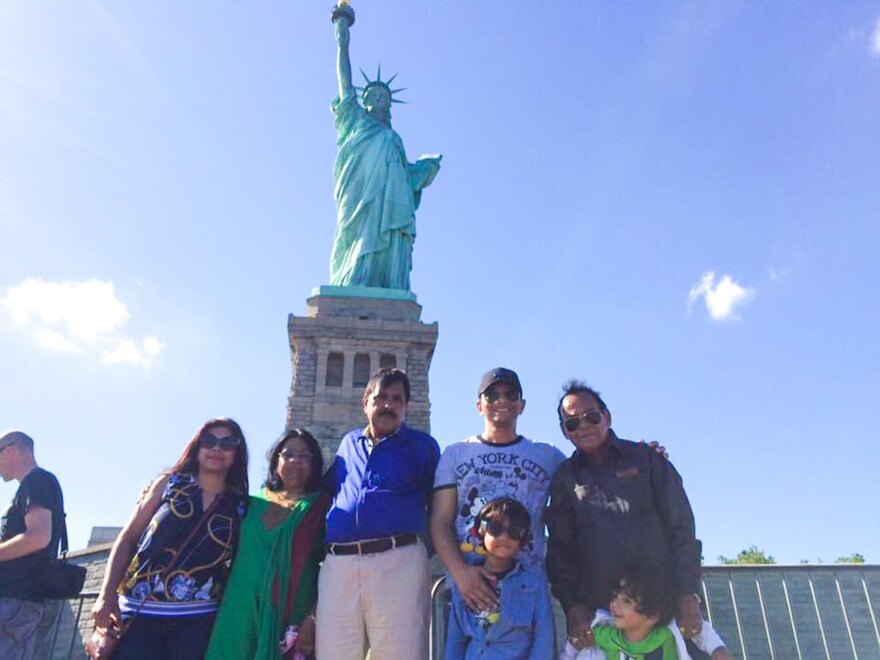 From left to right: Richa Srivastava, her mother, her father Sheo Prakash Srivastava, her husband Shalabh Pradhan, his father Sudheer Kumar Pradhan, and their children in an undated family photo at the Statue of Liberty.