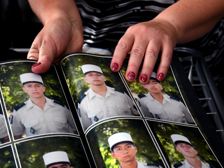 Oksana shows a photo of her son in his French Foreign Legion uniform.