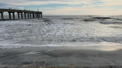Photo of rough surf along St. Augustine Beach.