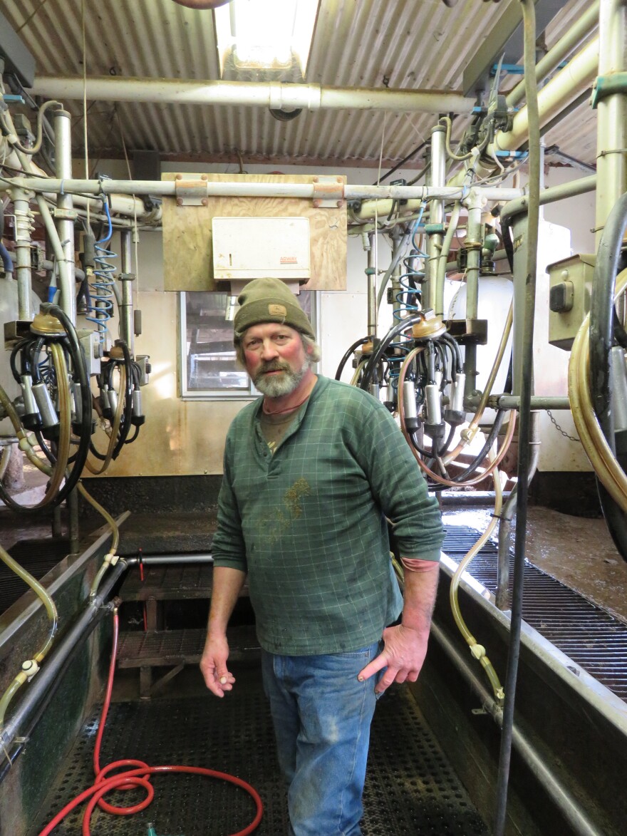 Farmer Will Rogers says he can no longer make ends meet milking the 75 cows on his dairy farm in Warren, Mass. Declining milk prices are taking a financial and emotional toll on dairy farmers, he says.