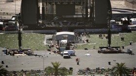 Debris is strewn through the scene of a mass shooting at a music festival near the Mandalay Bay resort and casino on the Las Vegas Strip, Monday, Oct. 2, 2017, in Las Vegas. (John Locher/AP)