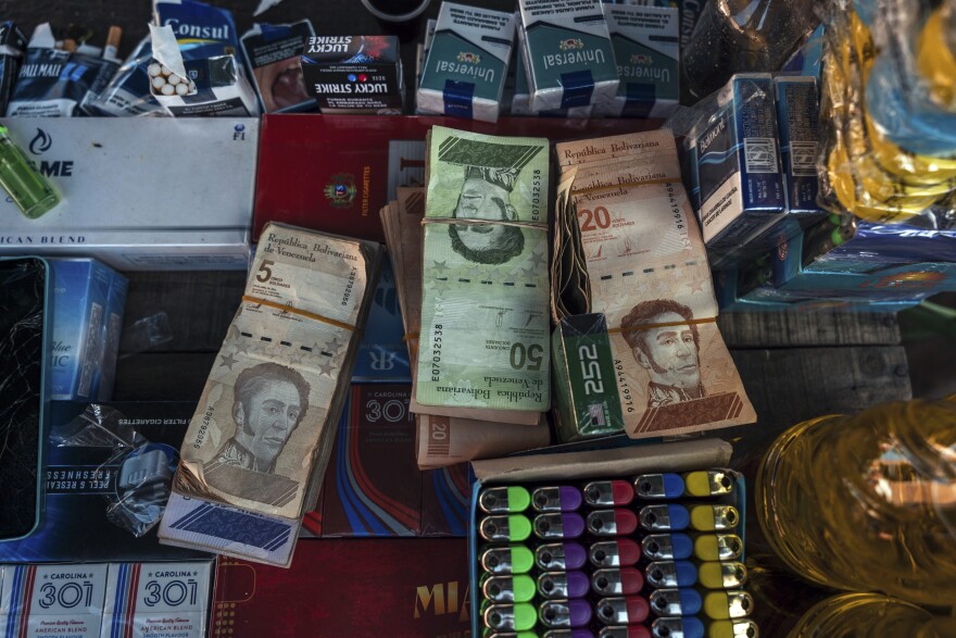 Stacks of Venezuelan bolívars.