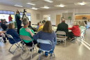 Greenway area residents listen to an announcement from Blandin Foundation Grants Director Kyle Erickson on Oct. 21, 2026 at the Marble City Hall.