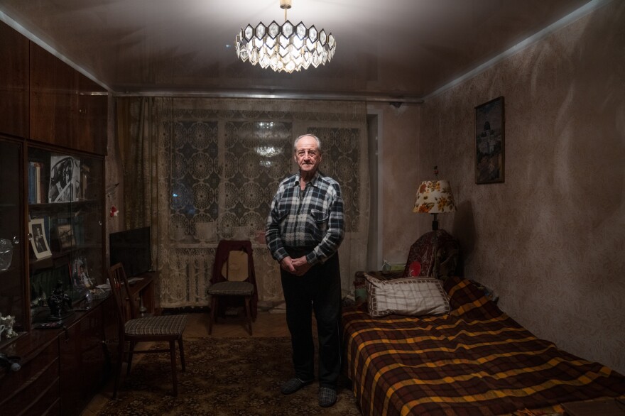 Pavlo Komodovskyi in his apartment in Kyiv, where he's stayed despite the war.