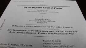 Aramis Ayala filed a lawsuit against Gov. Rick Scott after he reassigned cases from her office. 