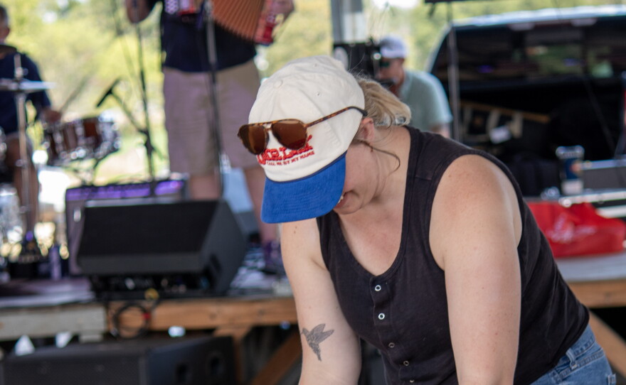 A mother and her young son dance along to polka from the Praha Brothers at Westfest on Saturday.