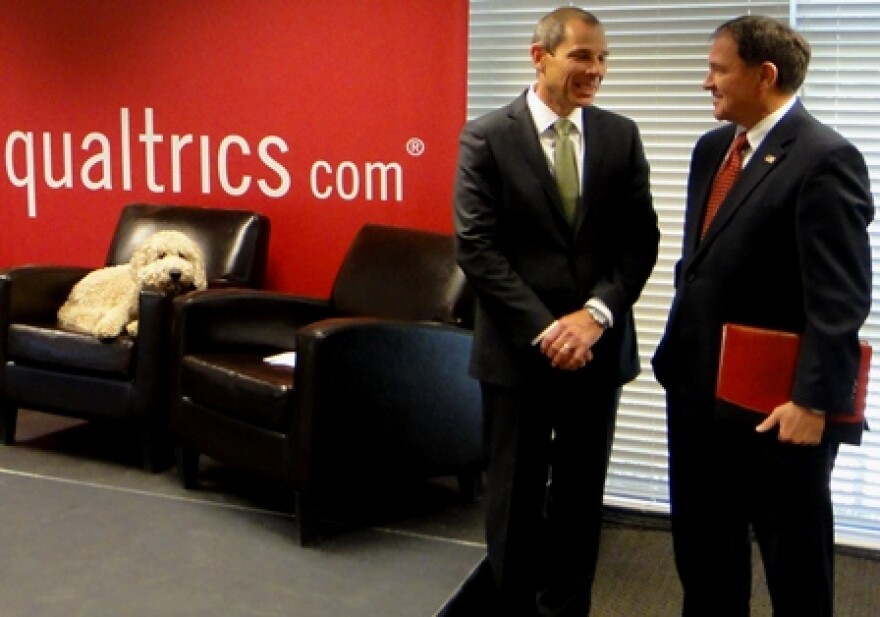 Utah Governor Gary Herbert, Provo Mayor John Curtis, and Barnaby the company dog were on hand for Qualtrics? announcement.