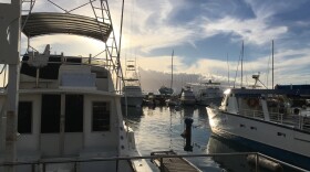 FILE - This 2016 photo shows Lahaina Harbor on Maui. The harbor was once a major hub during the 19th-century whaling boom, but then turned into a launching point for fishing, parasailing and ocean cruises.