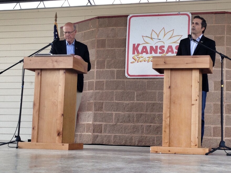 Republican Sen. Pat Roberts (left) debates independent candidate Greg Orman at the Kansas State Fair on Saturday.