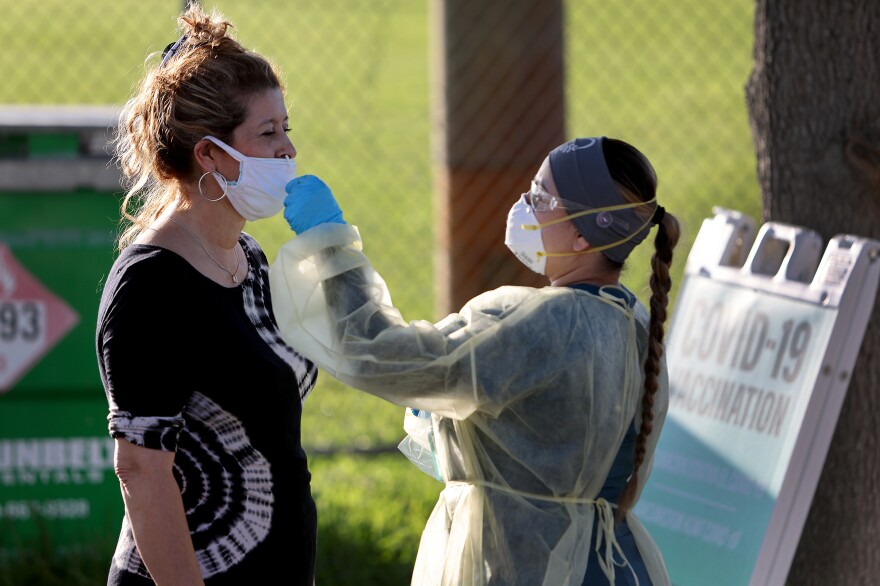 Lylliette Ramirez gets a coronavirus test in January in North Miami, Florida.