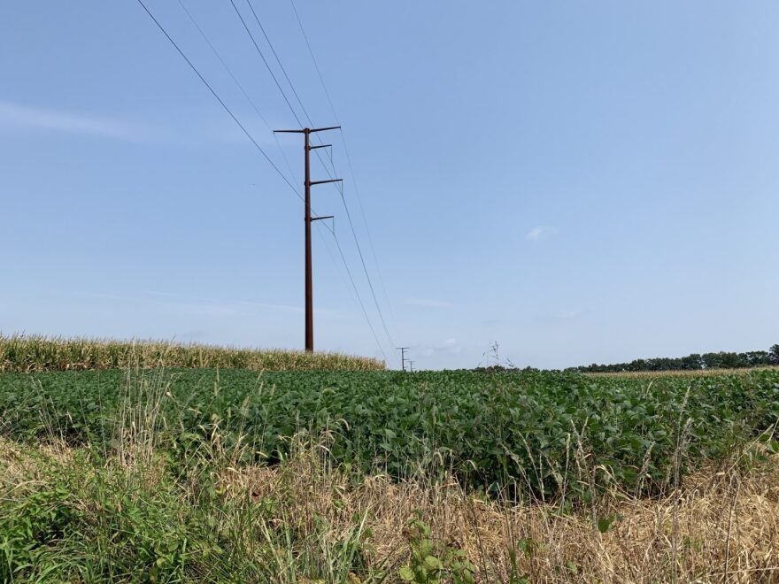 Rachel McDevitt / StateImpact Pennsylvania Transmission lines stretch through farm fields in Chanceford Township, York County on Sept. 13, 2021.