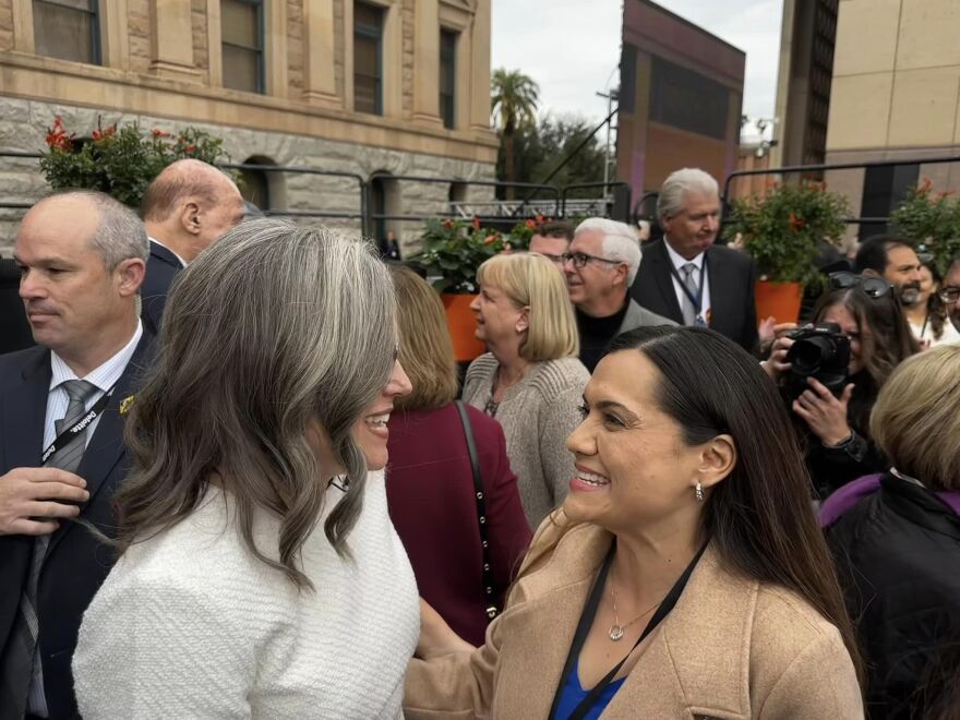 Anna Tovar, right, at the 2022 inauguration ceremony with Gov. Katie Hobbs.