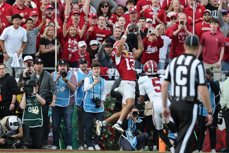 IU receiver Elijah Sarratt (13) catches a touchdown pass during the Hoosiers' victory over Alabama in the Rose Bowl.