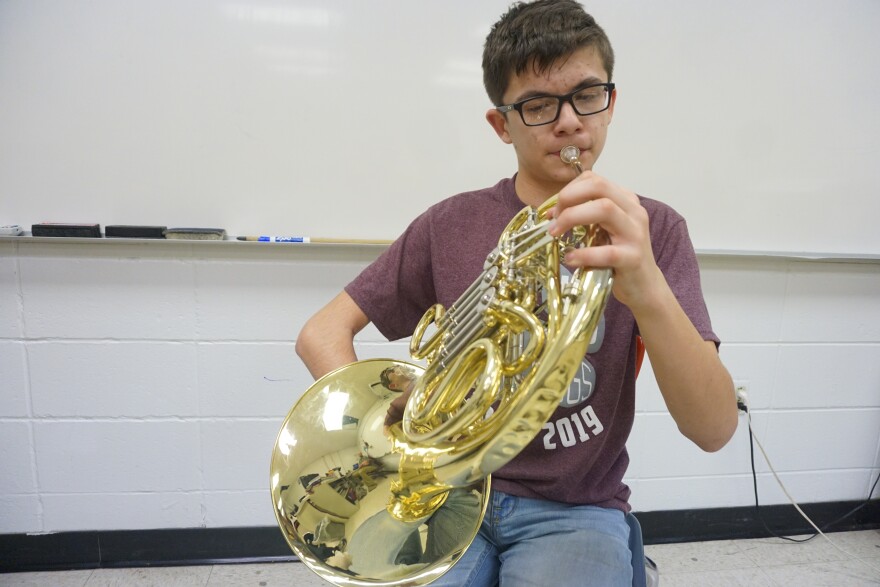 Carther Chance playing the French horn. His cerebral palsy limits the use of his right arm, which isn't needed for this insturment. 03-03-20