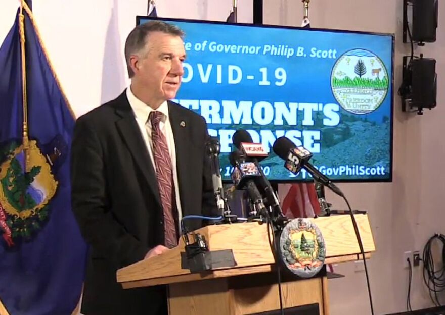 Phil Scott at a podium