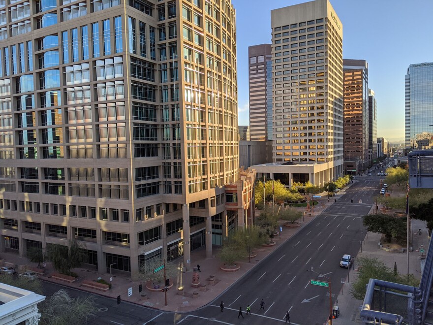 The city of Phoenix bought the former Wells Fargo Plaza (right background) located just east of City Hall.