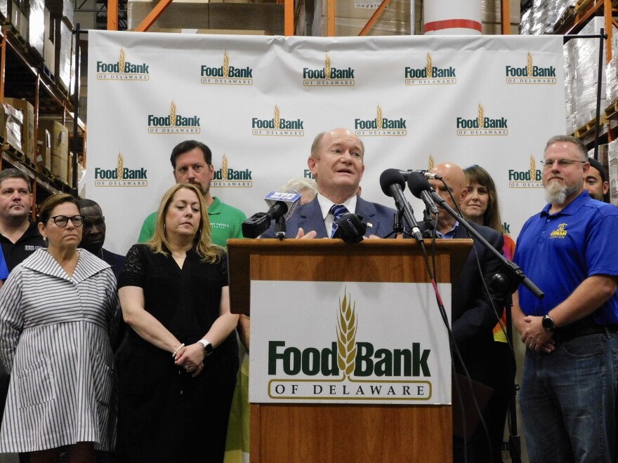 U.S. Sen. Chris Coons speaks at a press conference on Medicaid and SNAP cuts made by the “One, Big Beautiful Bill Act” on July 11, 2025, at the Food Bank of Delaware in Newark, Del.