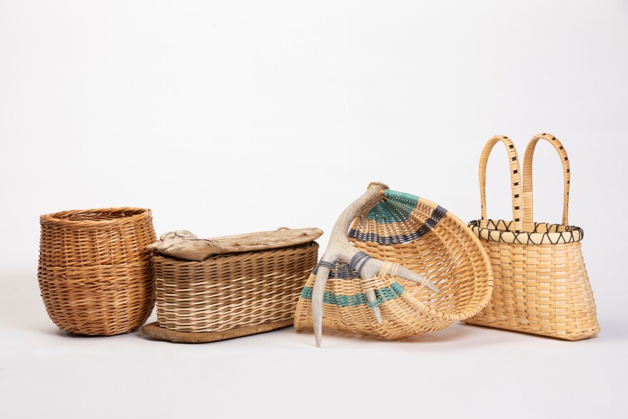 Four different kinds of baskets with a white background