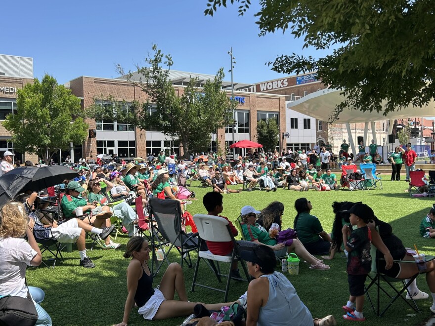 Soccer fans gather at Naftzger Park in downtown Wichita for the Global Fan Zone watch party.