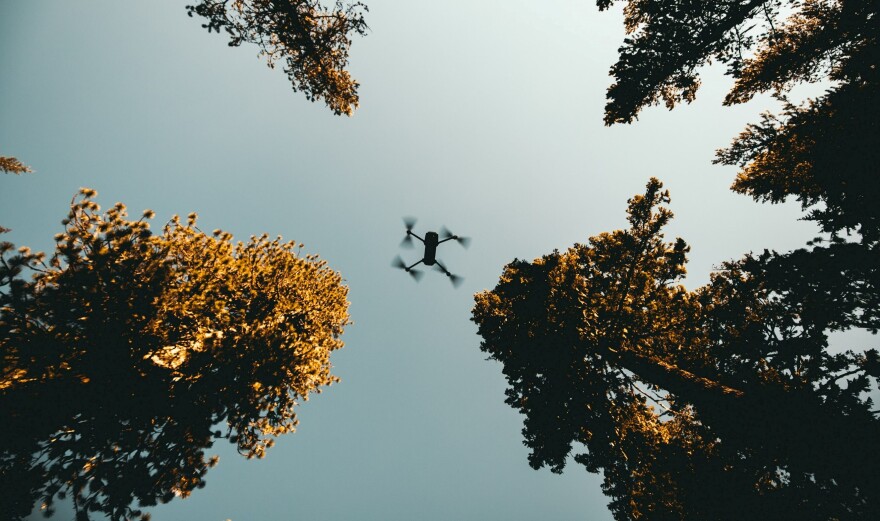  Aerial drone in woods.