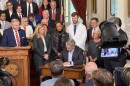 Gov. Josh Stein signs House Bill 696 into law on Thursday, April 30 at the North Carolina Governor's Mansion. The legislation provides $319 million to fund the state's Medicaid program for the rest of this fiscal year.