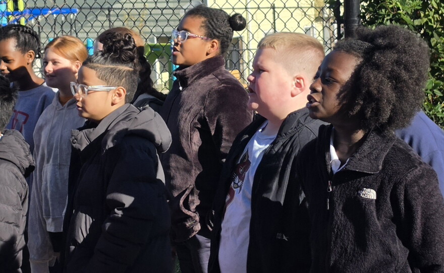 Whittier students sing "The Star-Spangled Banner" on Tuesday.
