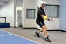 Top-ranked over 50 pickleball player Youssef Bouzidi lines up a backhand at Carilion Wellness.