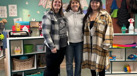 Patti McMullan stands between Brenna Becton and Nadia Segura, who were both interns. Now, Brenna is a lead teacher and Nadia is an assistant teacher at McMullan's daycare and early learning business. 