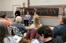 Town of Corning resident Joan Rosen introduces newly elected Democratic council members Linda Shock and Lauren Gaige during town hall meeting.