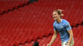 Manchester City's Sam Mewis celebrates after scoring her side's first goal during the Women's FA Cup final soccer match between Everton and Manchester City at Wembley stadium in London, Sunday, Nov. 1, 2020.