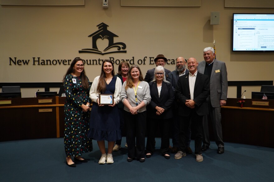 NHCS board on December 2, 2025. Second from left: Teacher Ashley Frye was honored and pictured.