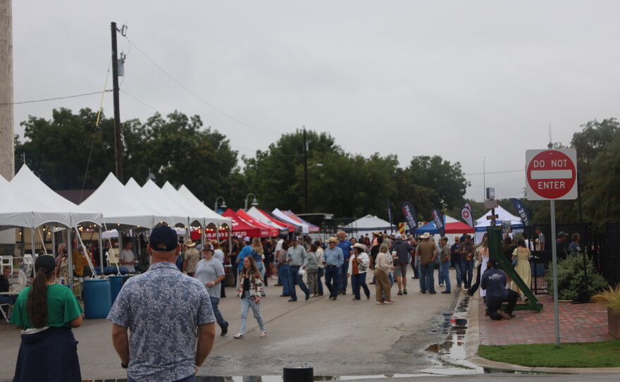 Attendees of the Feels Like Home Festival 2026 walking throughout the vendor village. Photo by Allison Diaz.