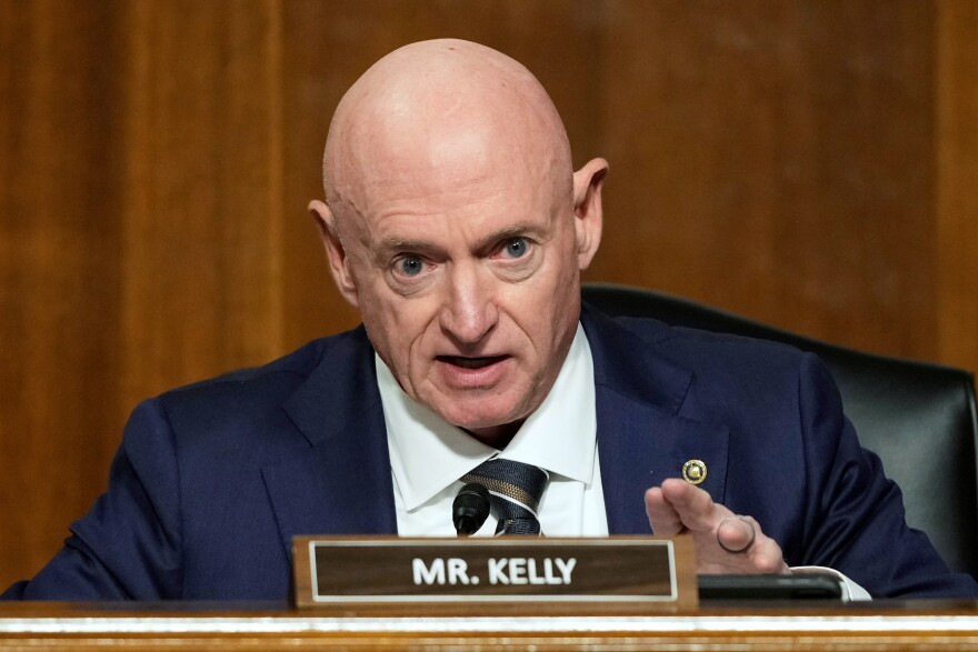 Sen. Mark Kelly, D-Ariz., speaks during the Senate Armed Services Committee confirmation hearing for Pete Hegseth, President-elect Donald Trump's choice to be Defense secretary, at the Capitol in Washington, Tuesday, Jan. 14, 2025.