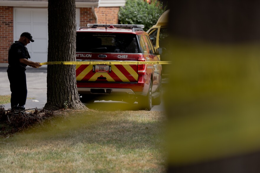 A St. Louis County officer ropes off a row of condos that were severely damaged after several homes exploded on Monday, Aug. 25, 2025, near Black Jack, Mo.