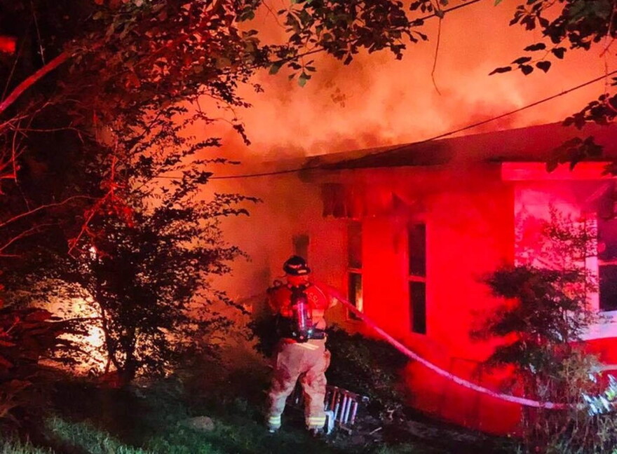 The home of Kim Ross and Brian Lee is a total loss after a Sunday night fire re-ignited early Monday morning. 