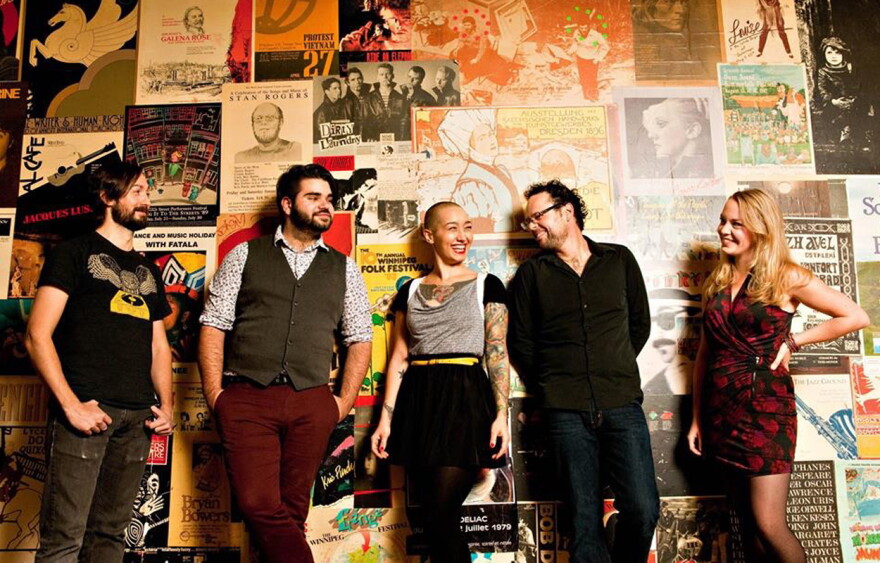 image of band members smiling