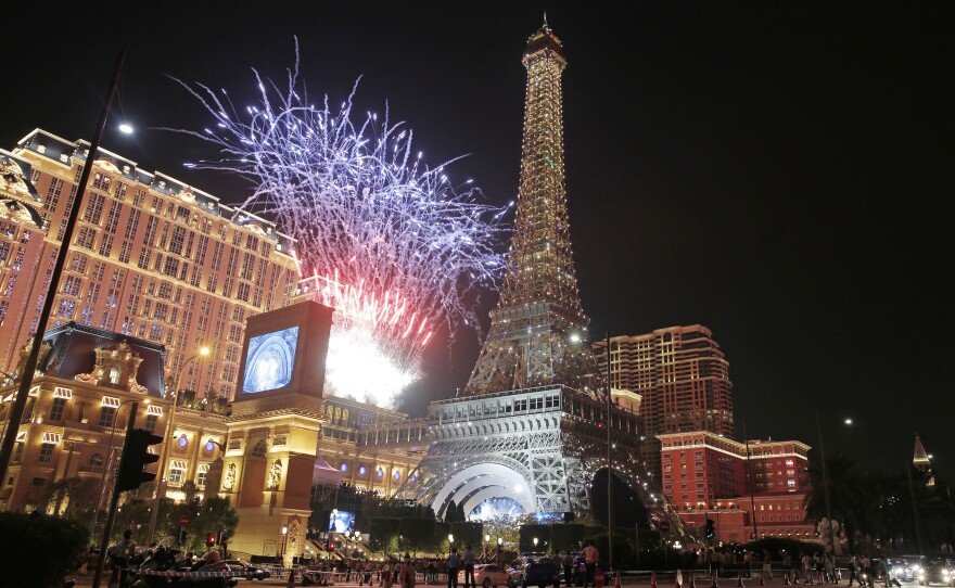 Fireworks explodes at a replica of the Eiffel Tower of Parisian Macao during an opening ceremony in Macau, China, on Sept. 13, 2016. The French-themed Parisian Macao is Sheldon Adelson's fifth property in the former Portuguese colony.